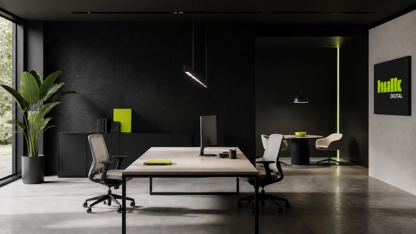 A modern, high-end digital agency studio with a team collaborating around a table.